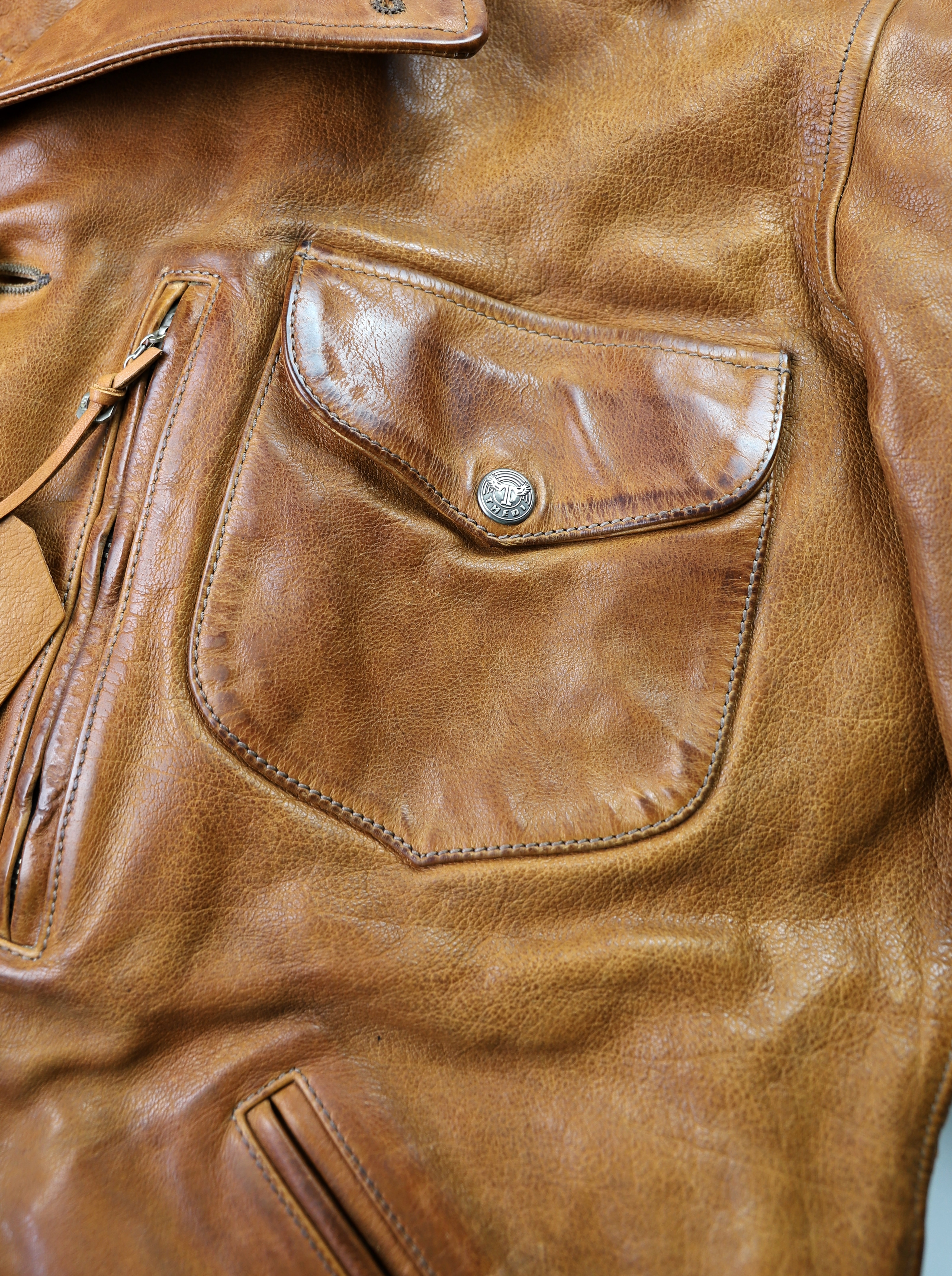 Thedi Hektor Washed Cuoio Buffalo chest pocket.jpg