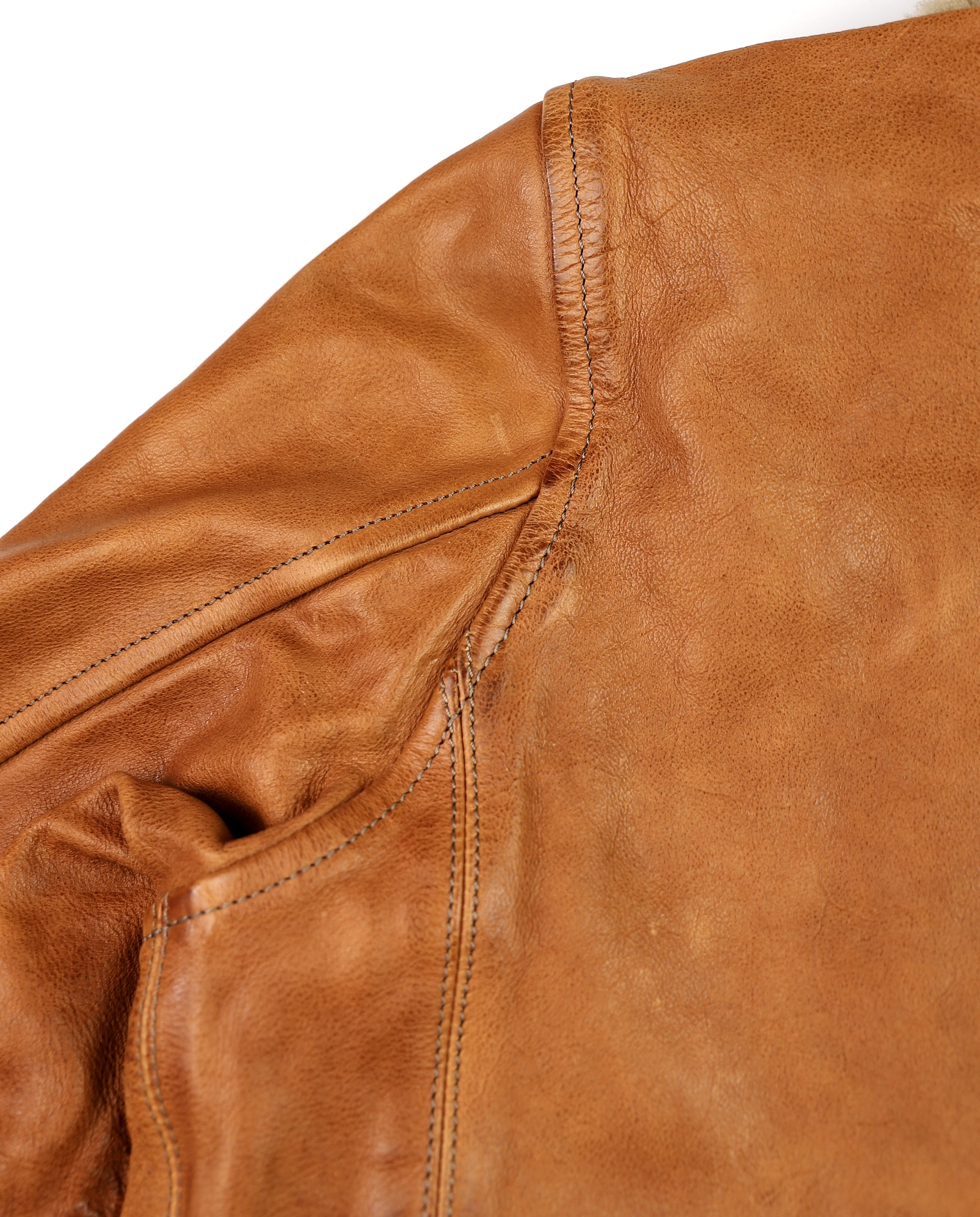 Thedi Idas Cognac Buffalo shoulder seam.jpg