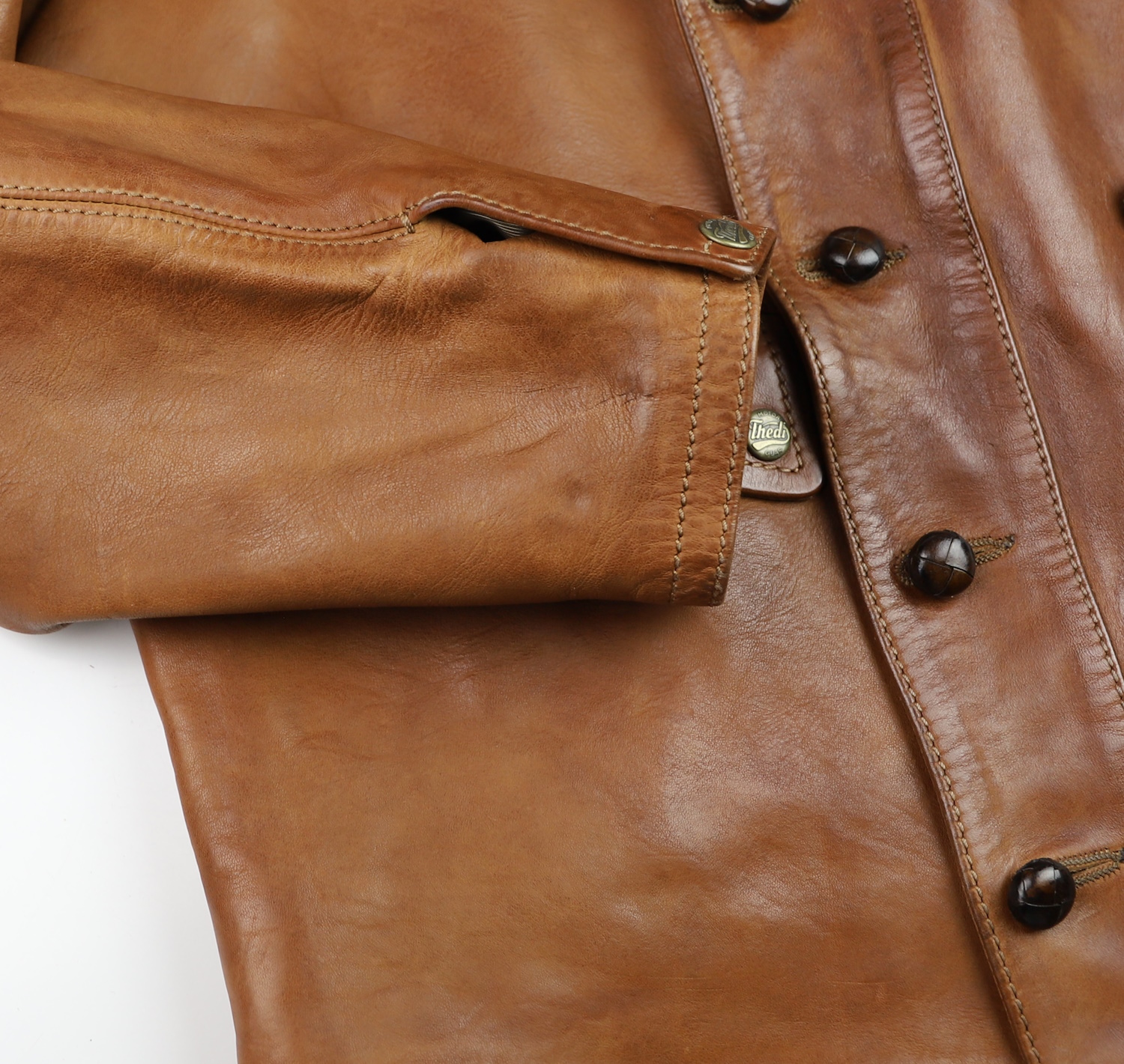 Thedi Kronos Undyed Bruciato Horsehide sleeve cuff.jpg