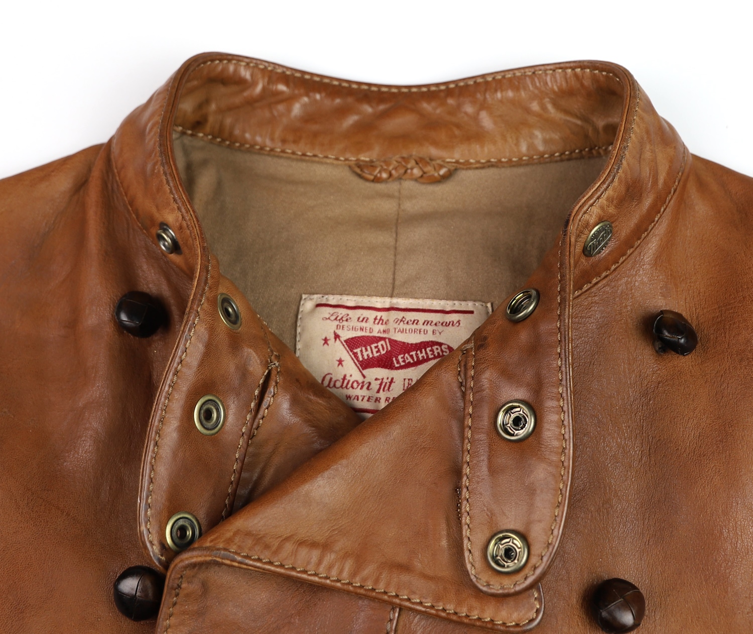 Thedi Kronos Undyed Bruciato Horsehide tag.jpg