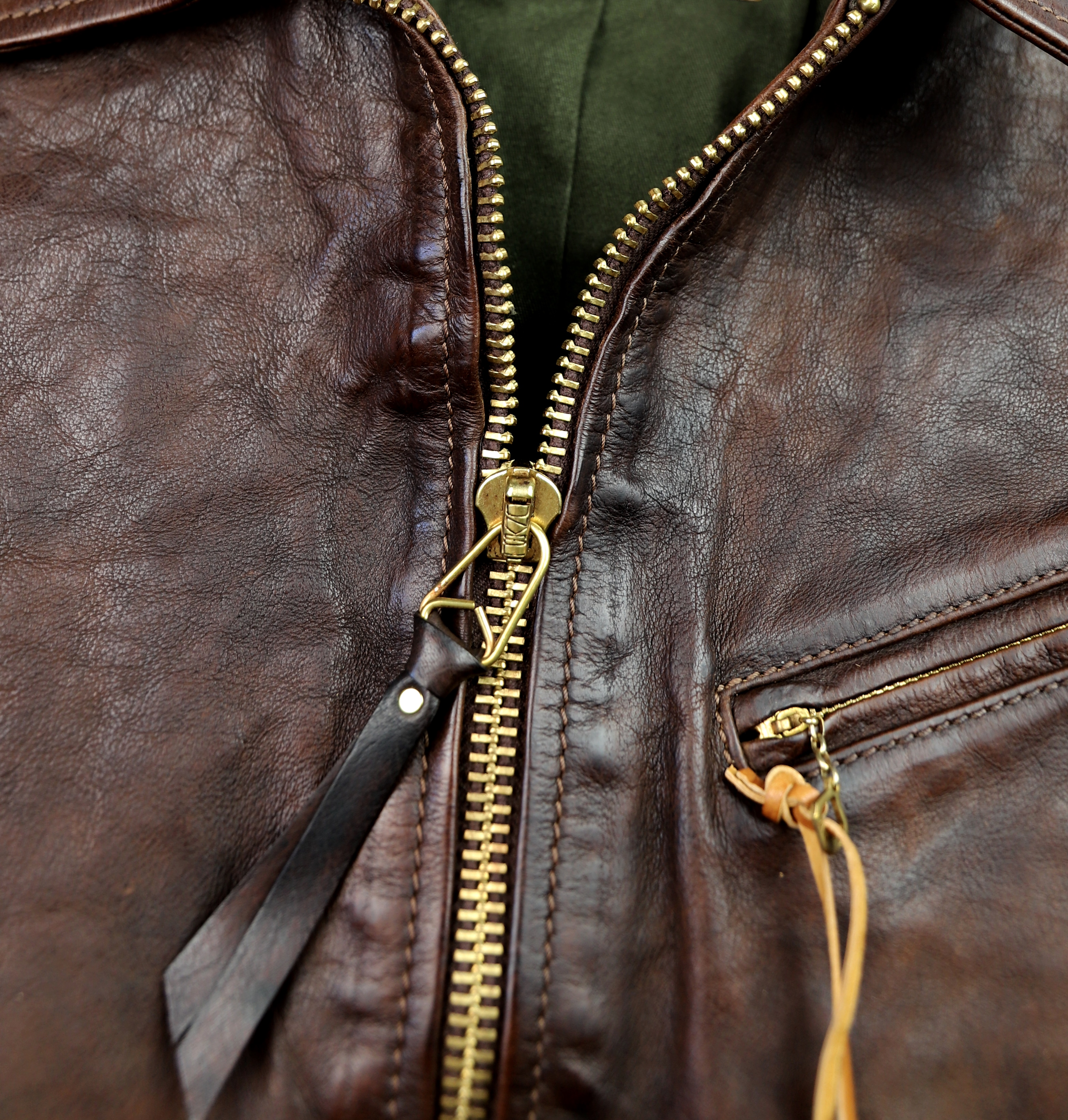 Thedi Memphis Cocoa Buffalo ME1 zipper pull.jpg