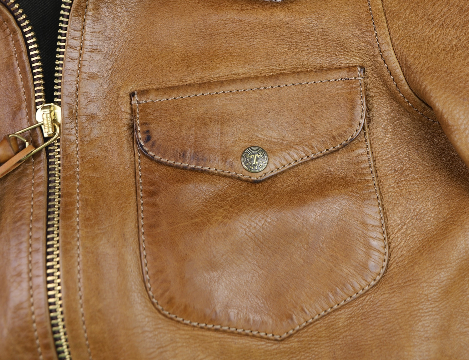 Thedi Memphis Undyed Bruciato Horsehide chest pocket.jpg