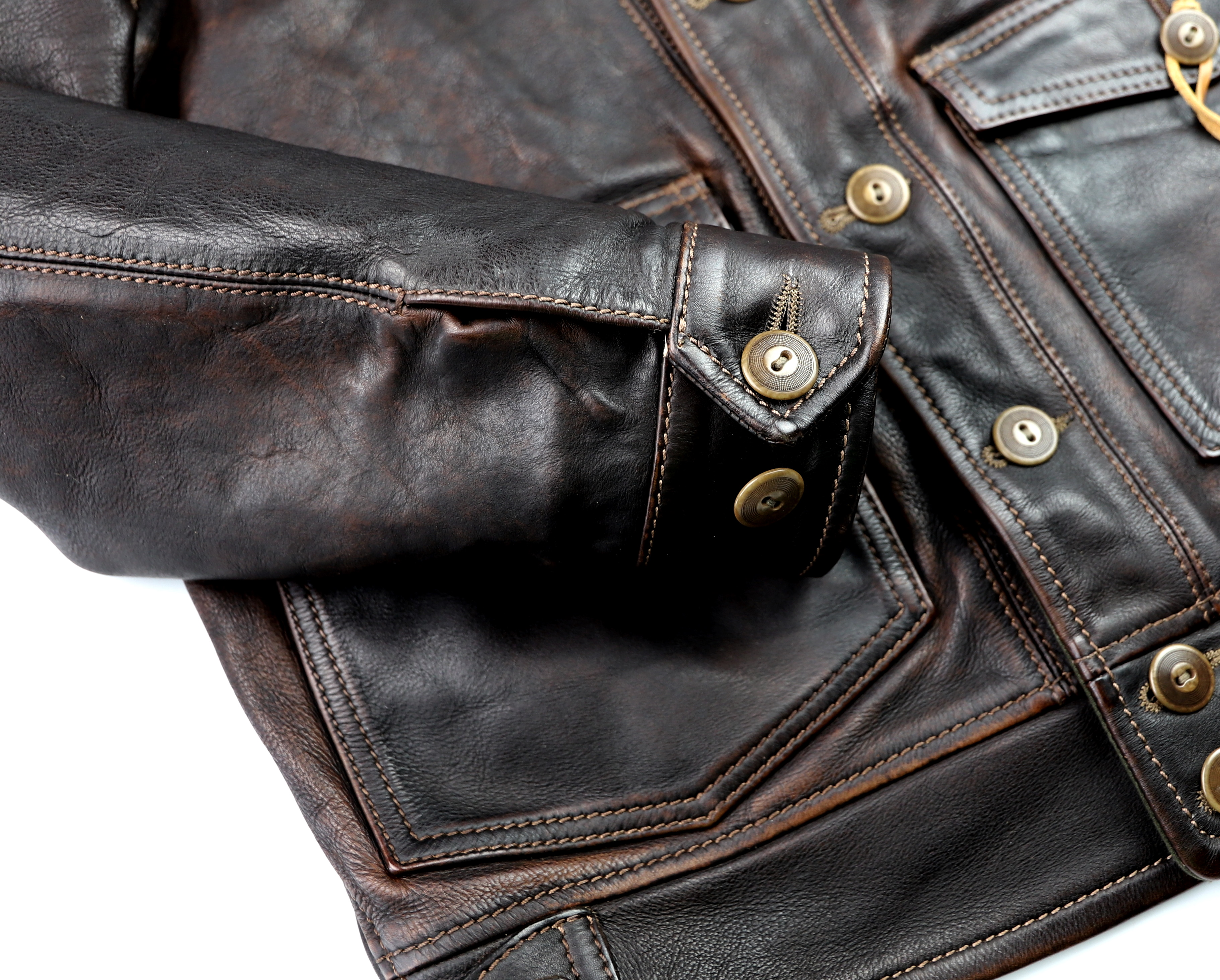 Thedi Niko Button-Up Hand-Dyed Brown Cowhide JG1 button cuff.jpg