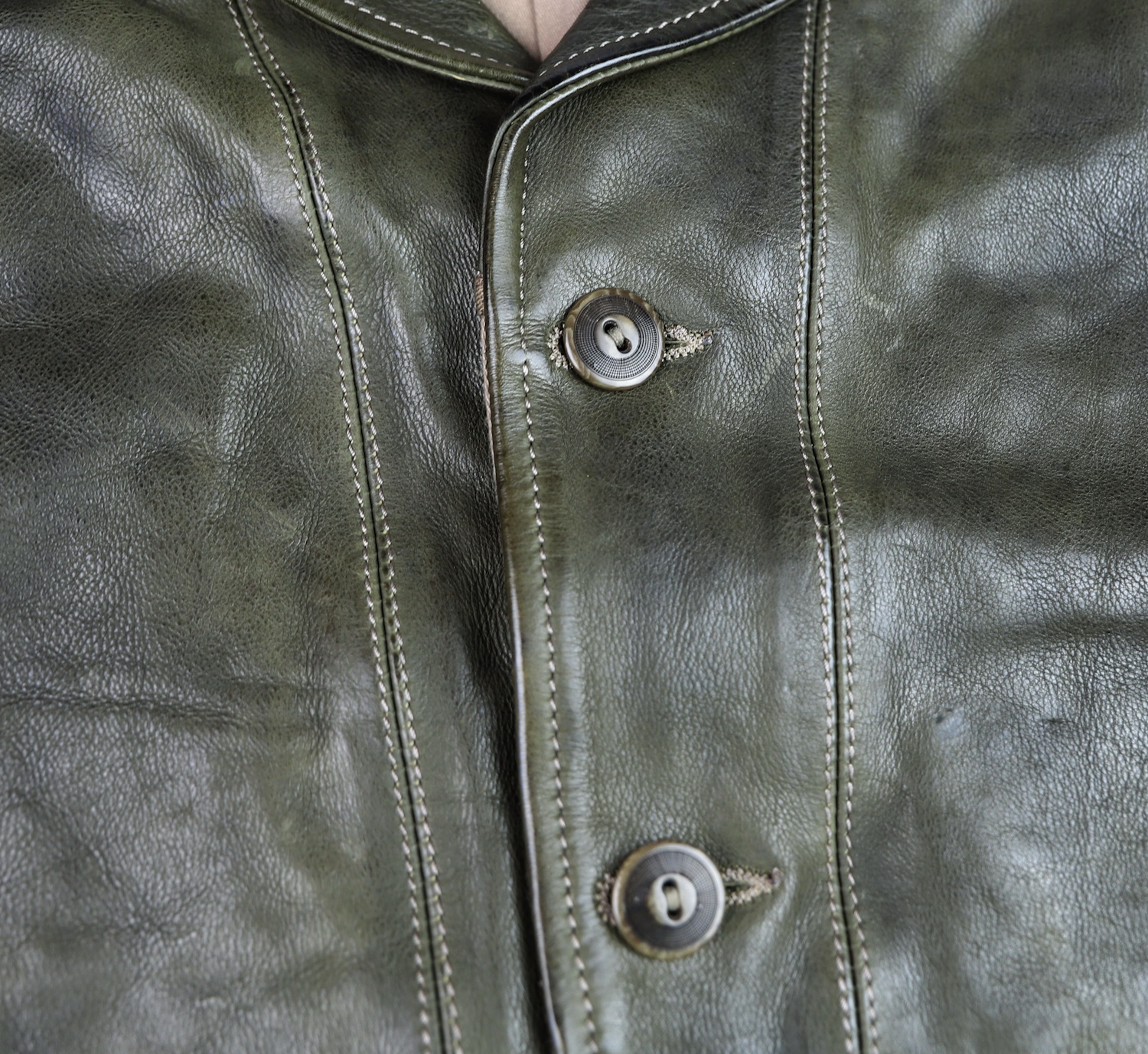 Thedi Niko Green Cowhide button.jpg