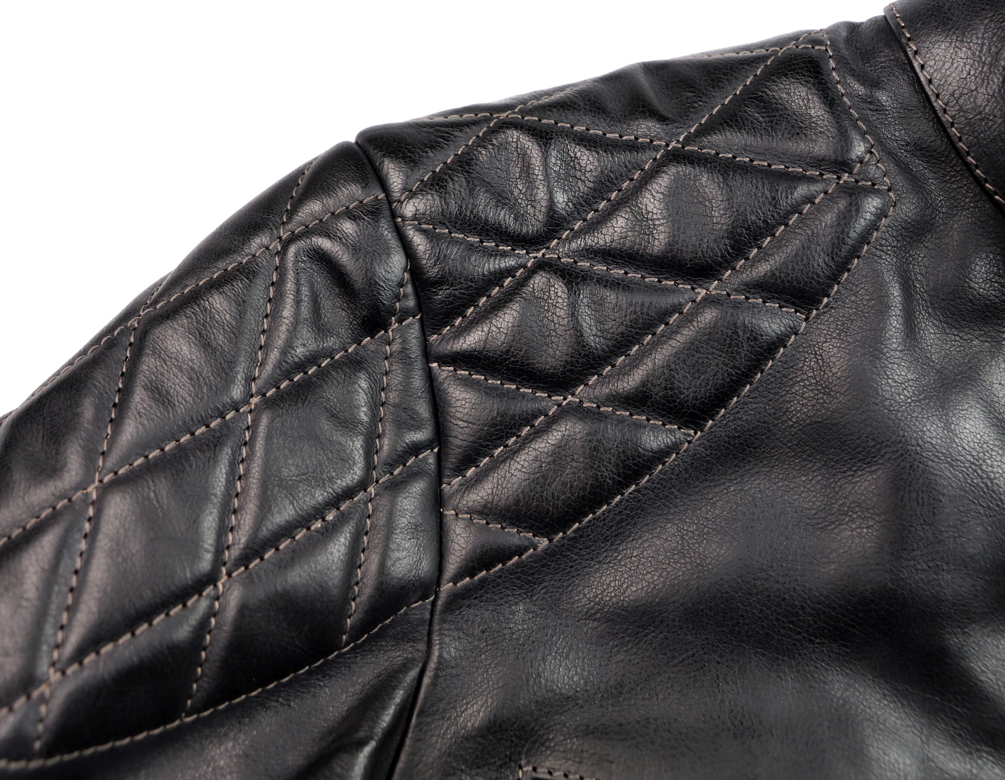 Thedi Phenix Black Buffalo M1K shoulder quilting.jpg