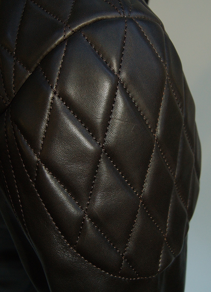 Thedi Phenix Dark Brown Horsehide shoulder quilting smaller.jpg