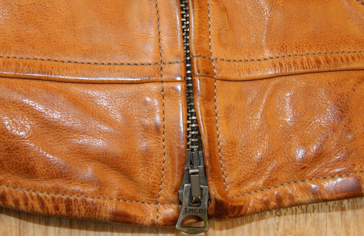 Thedi Titan Washed Cognac Buffalo bottom zip.jpg