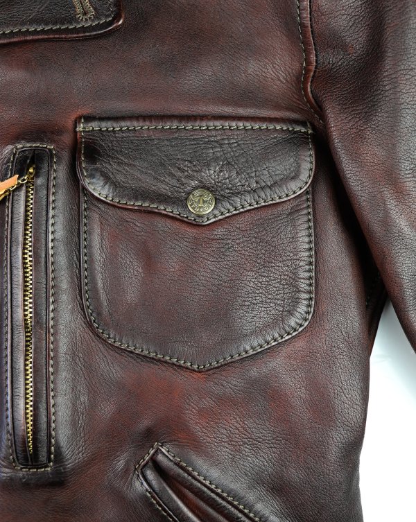 Thedi Hektor Burgundy Bruciato horsehide chest pocket.jpg